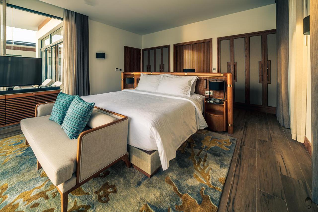 富国岛瑞享别墅及公寓 外观 照片 A bedroom at the hotel
