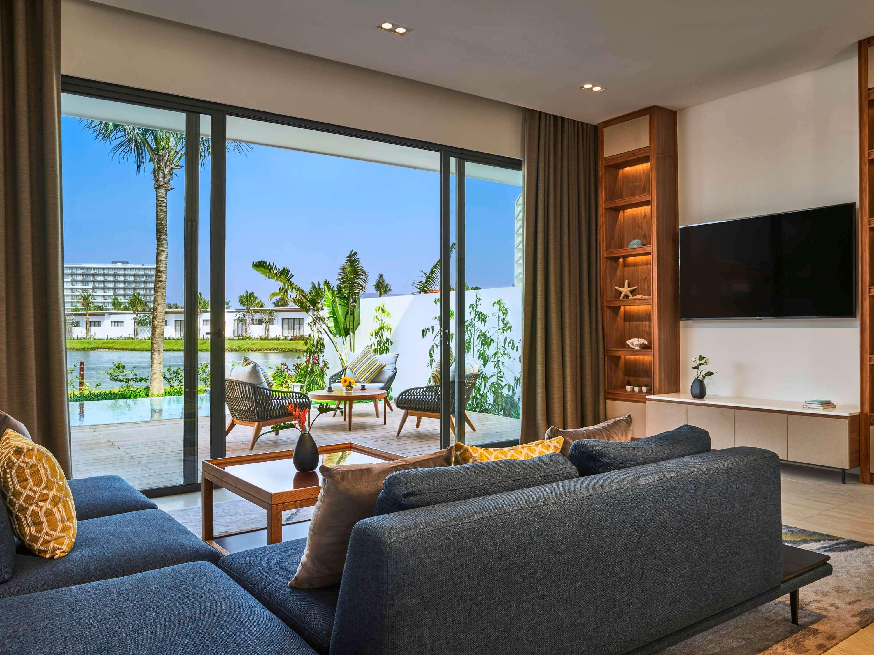 富国岛瑞享别墅及公寓 外观 照片 A living room at the hotel