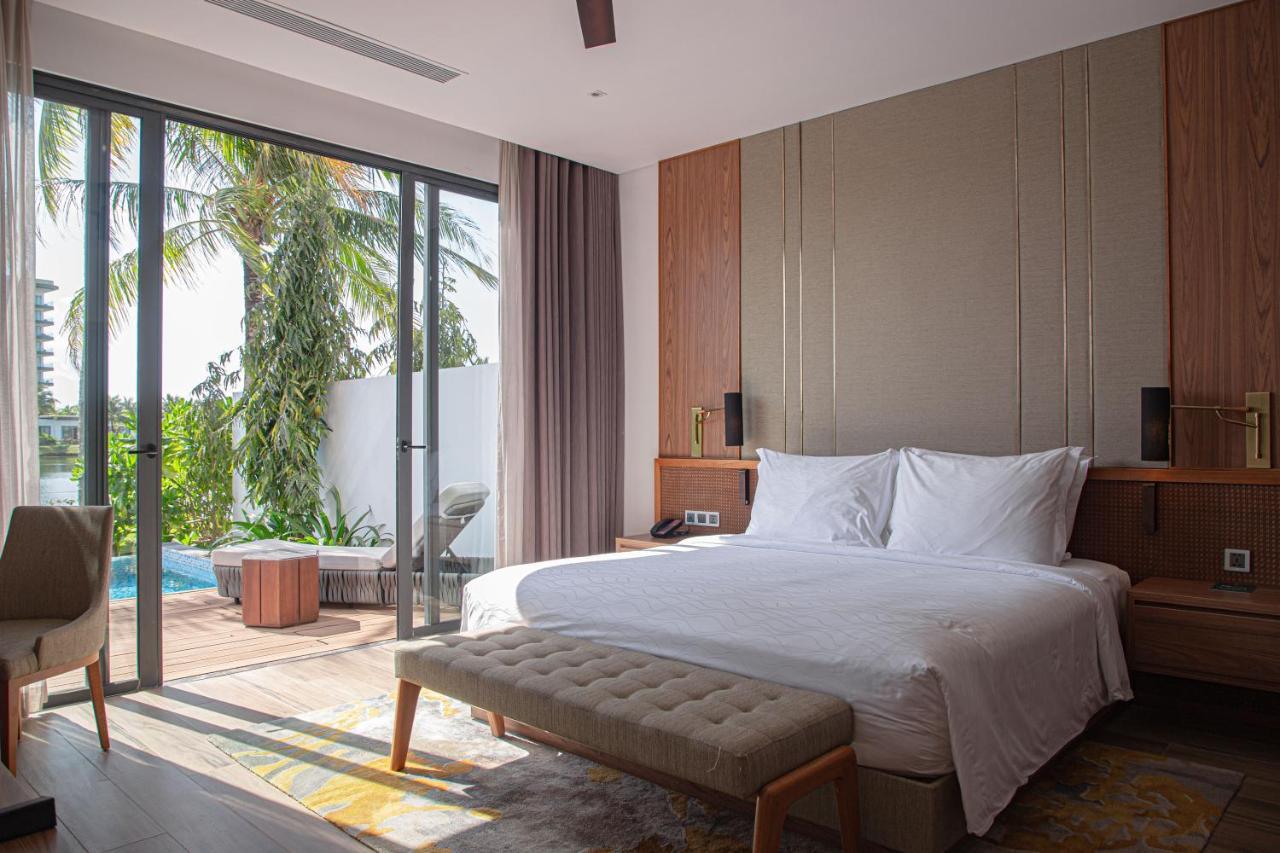 富国岛瑞享别墅及公寓 外观 照片 A bedroom at the hotel