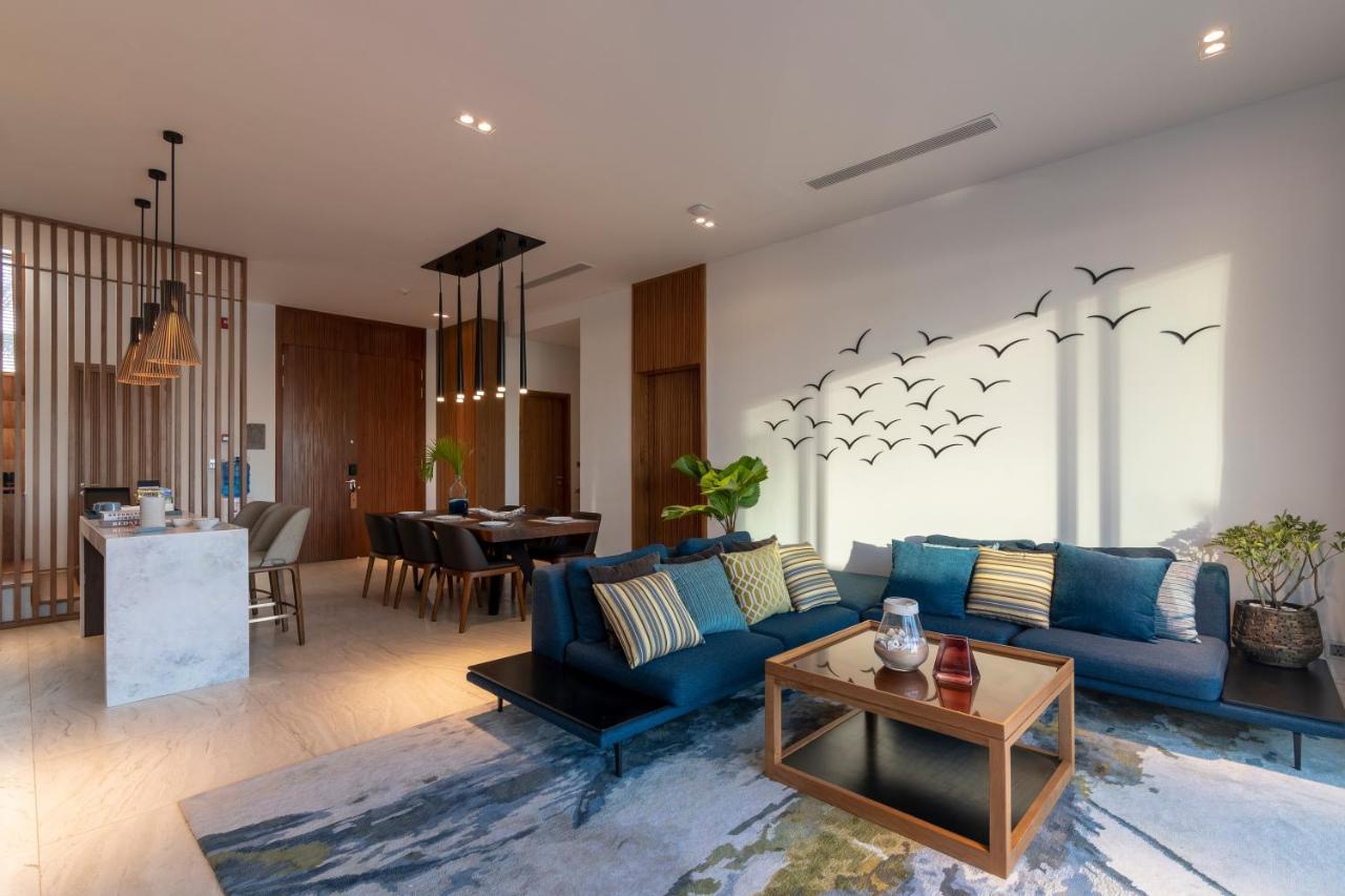 富国岛瑞享别墅及公寓 外观 照片 A living room in a condominium