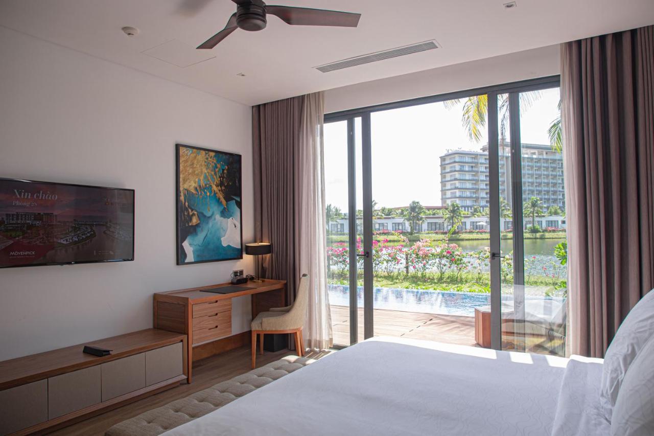 富国岛瑞享别墅及公寓 外观 照片 A bedroom at the hotel
