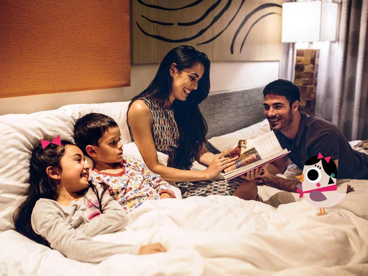 富国岛瑞享别墅及公寓 外观 照片 Family at the hotel