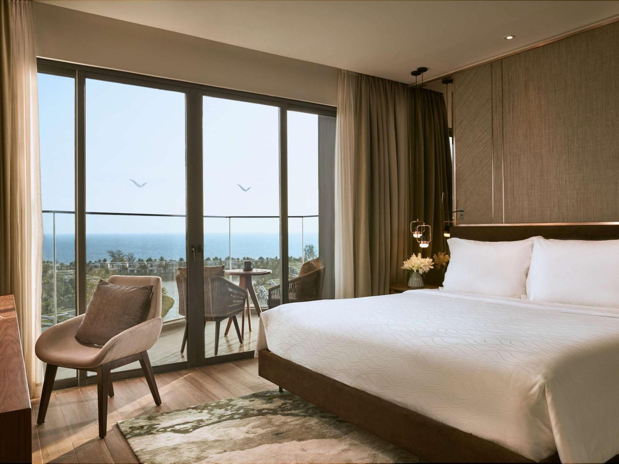 富国岛瑞享别墅及公寓 外观 照片 A bedroom at the hotel